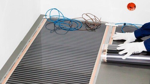 Укладка нагревательного мата инфракрасного теплого пола