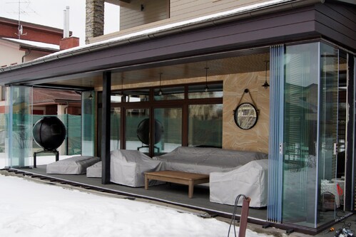 Раздвижное безрамное остекление