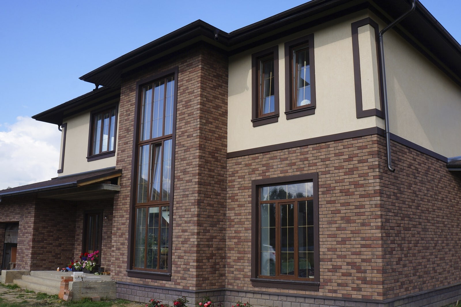 Облицовка дома панелями под «кирпич»